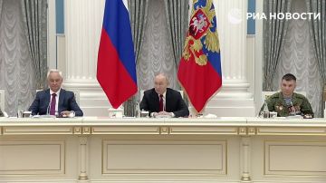 Путин встретился с участниками СВО в День России