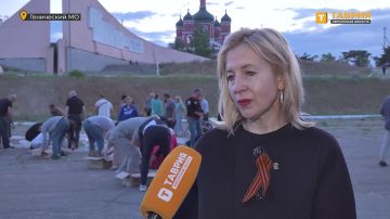 Активисты "Единой России" и "Молодой Гвардии" зажгли 3000 свечей в рамках акции "Огненные картины войны"